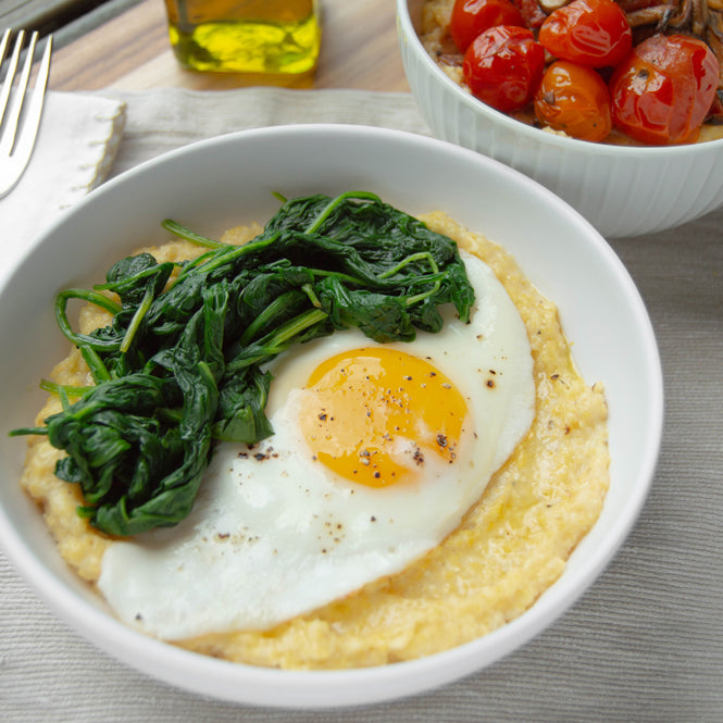 Stone Ground Yellow Grits with Spinach and a Fried Egg.  Carolina Grits Company produces traditional stone ground grits and cornmeal.  Located in Rocky Mount, North Carolina.  Gluten Free.  Whole Grain.  